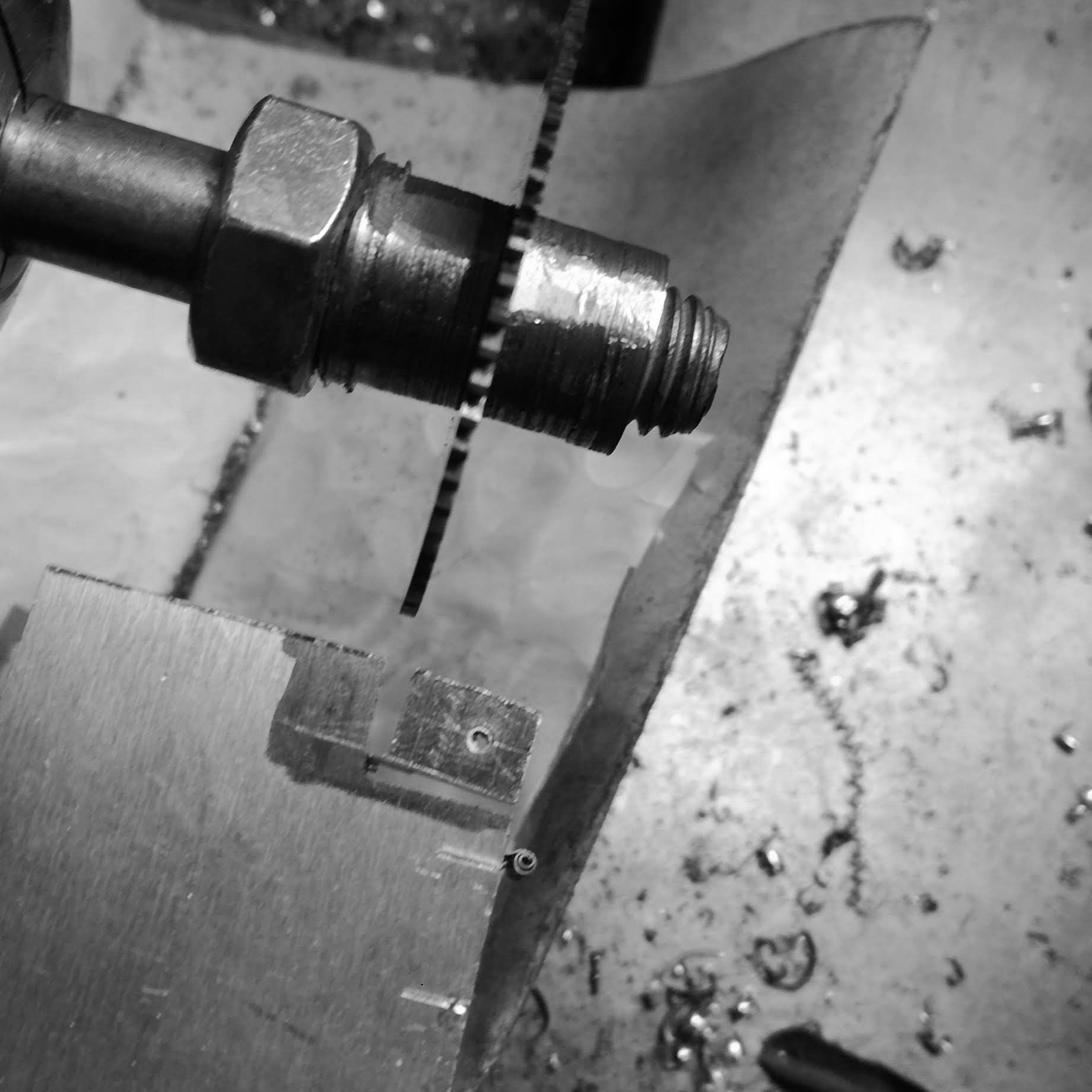 Cutting the part off with the slitting saw on the lathe.