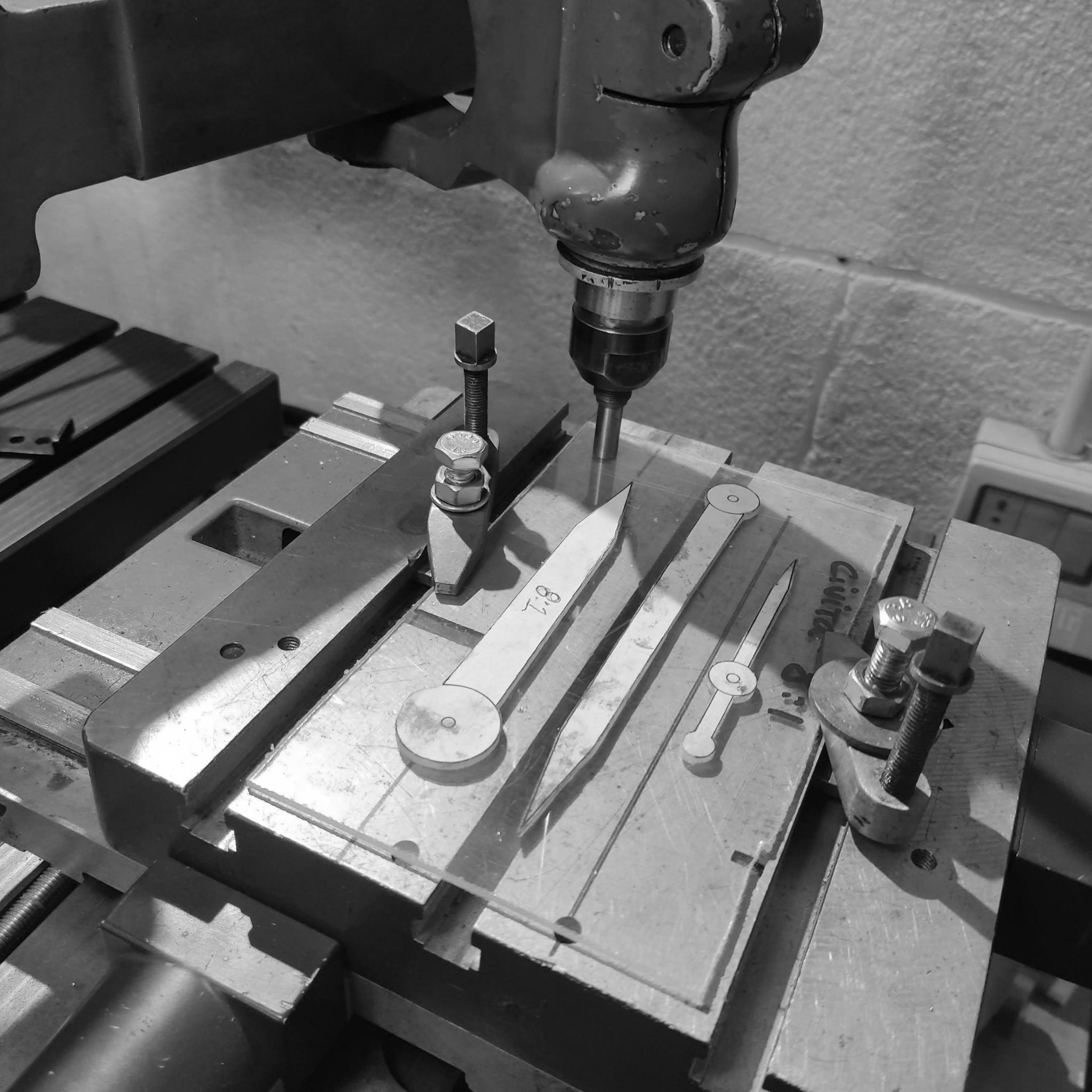 The tracer table, which guides the milling spindle to create the shape of the pattern at the reduced scale.