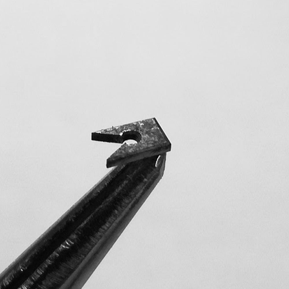 The hairspring stud, it presents the most surface rust of the whole watch.
