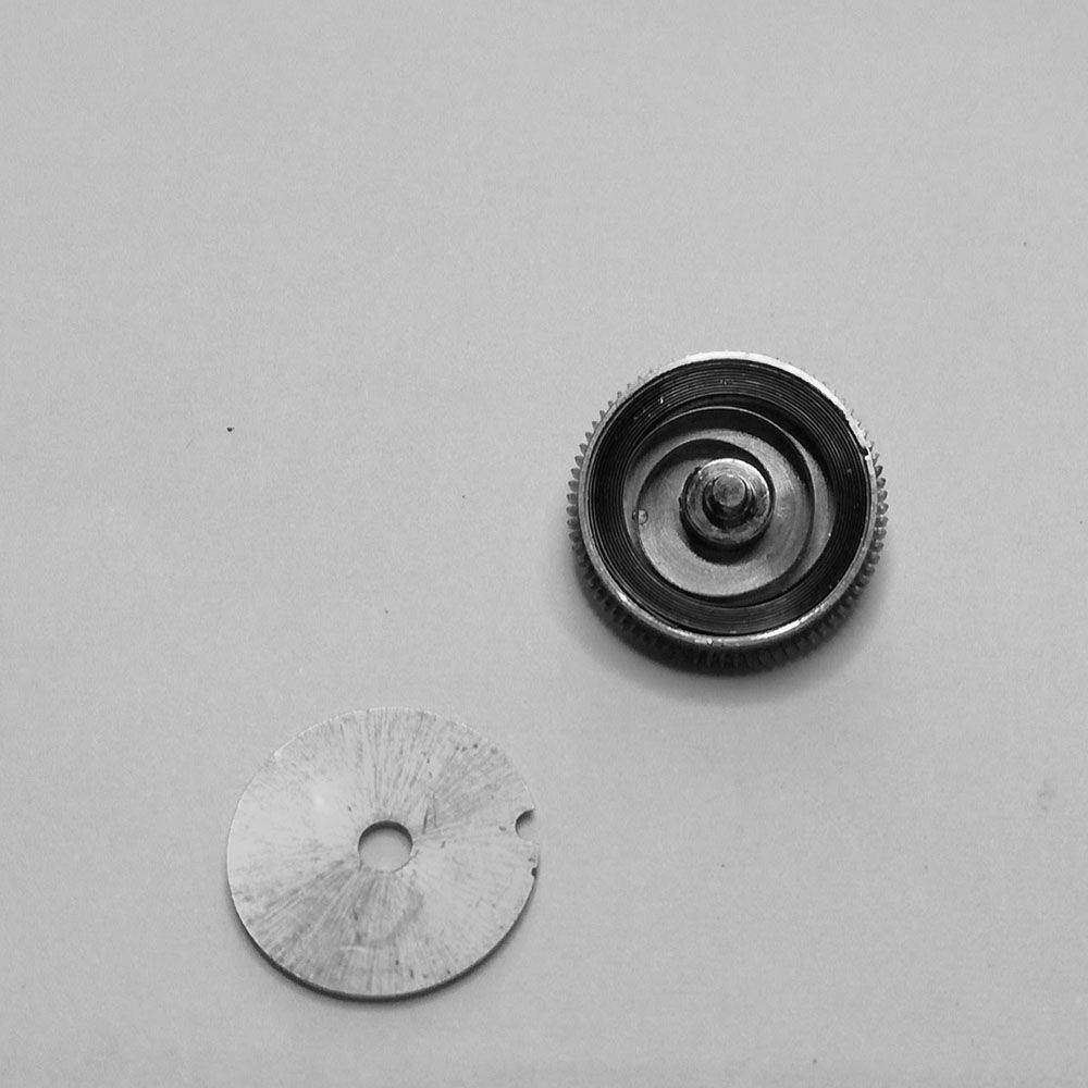 The mainspring is wound and inserted in the barrel so that it is not distorted (which creates uneven timekeeping rates).
