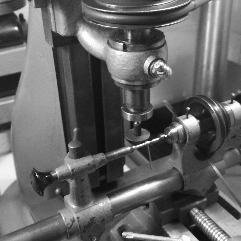 Using the watchmaker's lathe and jig borer to get a good concentric arbor around the hole.