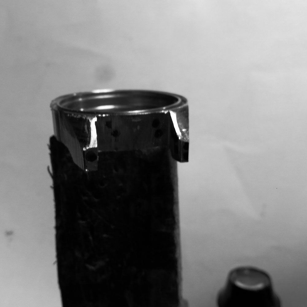 Hand filing a flat band on the to of the lugs.